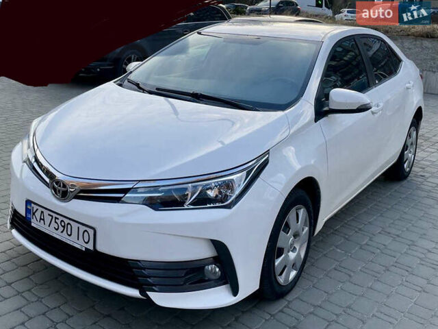 Білий Тойота Королла, об'ємом двигуна 1.6 л та пробігом 205 тис. км за 14500 $, фото 1 на Automoto.ua