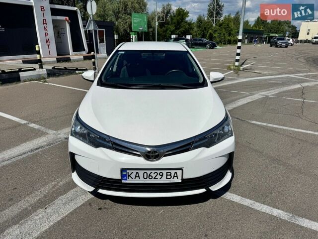 Білий Тойота Королла, об'ємом двигуна 1.6 л та пробігом 129 тис. км за 11500 $, фото 1 на Automoto.ua