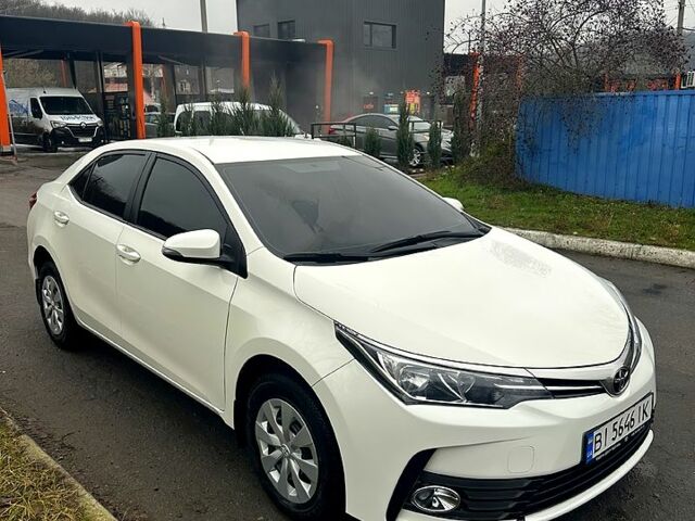 Білий Тойота Королла, об'ємом двигуна 1.6 л та пробігом 205 тис. км за 13700 $, фото 1 на Automoto.ua