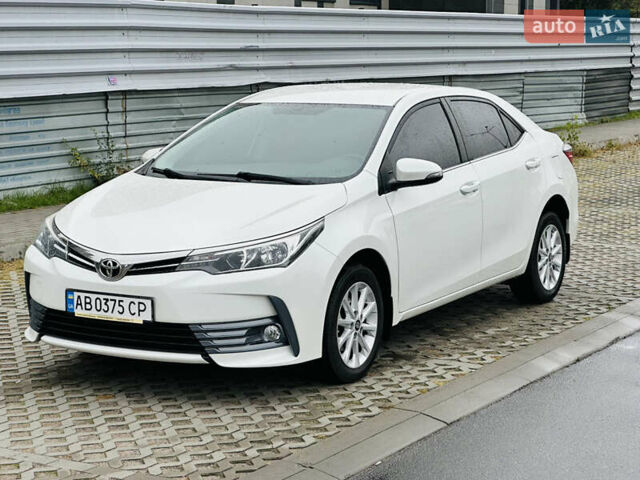 Білий Тойота Королла, об'ємом двигуна 1.6 л та пробігом 72 тис. км за 13700 $, фото 1 на Automoto.ua