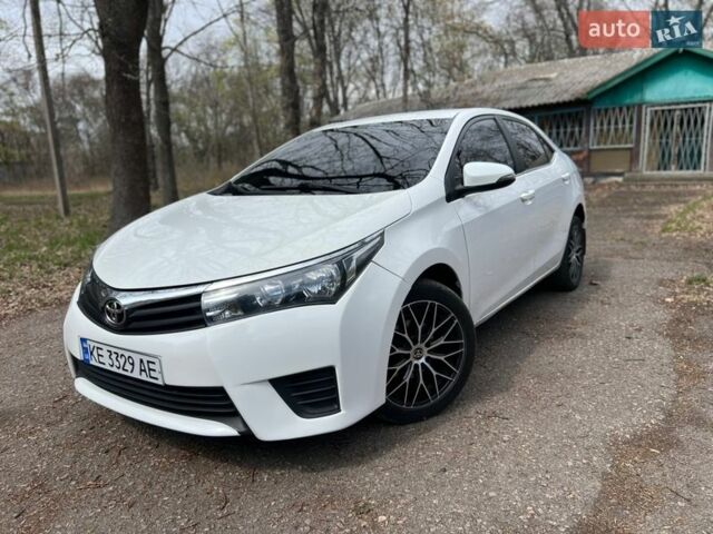 Білий Тойота Королла, об'ємом двигуна 1.6 л та пробігом 244 тис. км за 9700 $, фото 1 на Automoto.ua