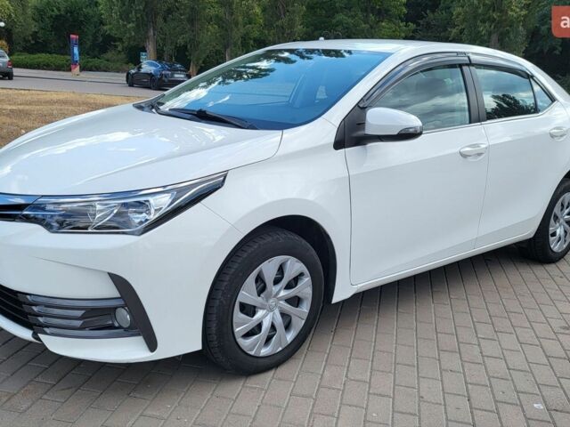 Белый Тойота Королла, объемом двигателя 1.6 л и пробегом 115 тыс. км за 15000 $, фото 1 на Automoto.ua