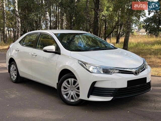 Белый Тойота Королла, объемом двигателя 1.6 л и пробегом 98 тыс. км за 10950 $, фото 1 на Automoto.ua
