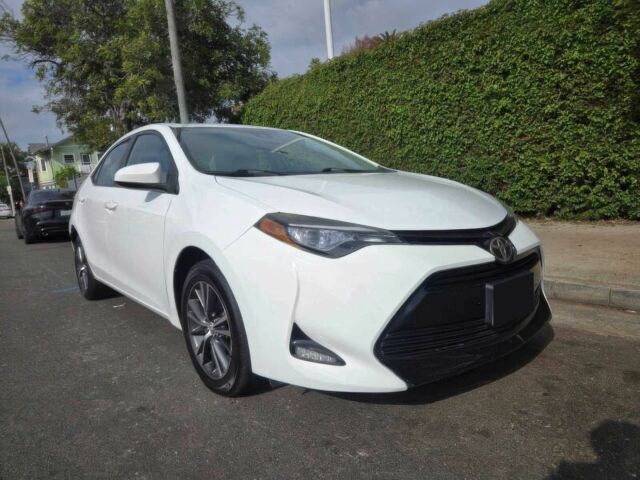 Белый Тойота Королла, объемом двигателя 1.8 л и пробегом 68 тыс. км за 3300 $, фото 1 на Automoto.ua