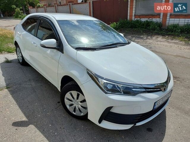 Белый Тойота Королла, объемом двигателя 1.3 л и пробегом 190 тыс. км за 10800 $, фото 1 на Automoto.ua