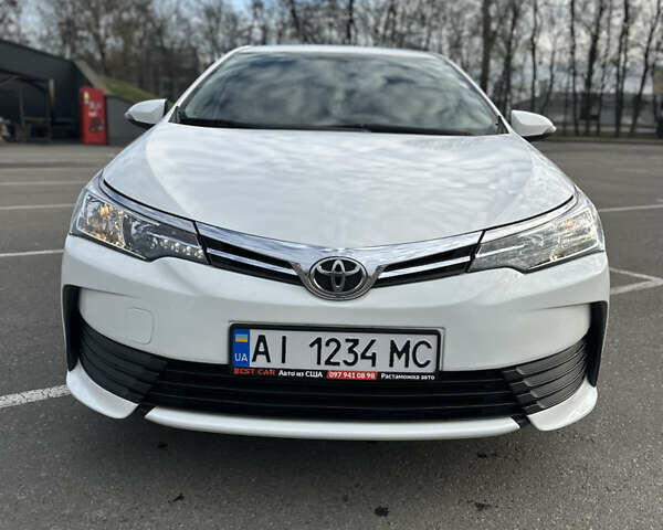 Белый Тойота Королла, объемом двигателя 1.6 л и пробегом 143 тыс. км за 13500 $, фото 1 на Automoto.ua