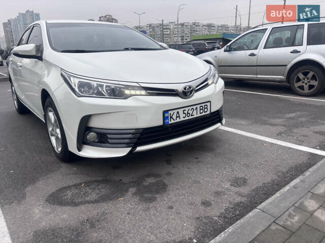 Білий Тойота Королла, об'ємом двигуна 1.6 л та пробігом 128 тис. км за 15200 $, фото 1 на Automoto.ua