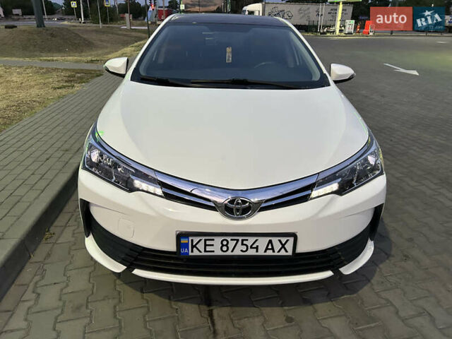 Білий Тойота Королла, об'ємом двигуна 1.6 л та пробігом 143 тис. км за 11700 $, фото 1 на Automoto.ua