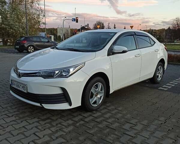 Белый Тойота Королла, объемом двигателя 1.6 л и пробегом 147 тыс. км за 12700 $, фото 1 на Automoto.ua