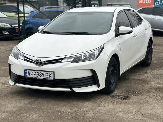 Білий Тойота Королла, об'ємом двигуна 1.3 л та пробігом 98 тис. км за 13000 $, фото 1 на Automoto.ua