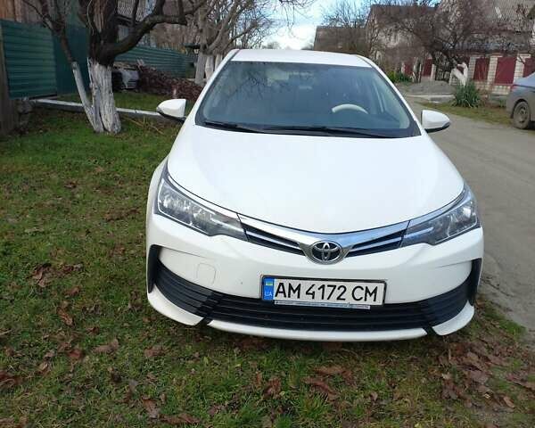 Білий Тойота Королла, об'ємом двигуна 1.33 л та пробігом 41 тис. км за 12500 $, фото 1 на Automoto.ua