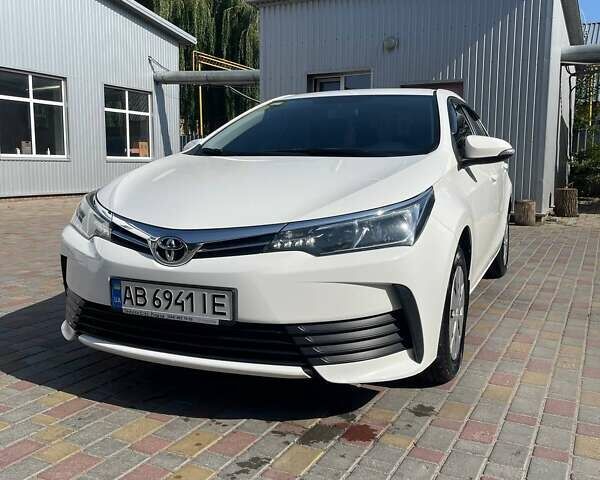 Белый Тойота Королла, объемом двигателя 1.6 л и пробегом 103 тыс. км за 13000 $, фото 1 на Automoto.ua