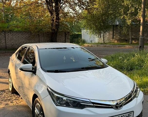 Белый Тойота Королла, объемом двигателя 1.6 л и пробегом 104 тыс. км за 16700 $, фото 1 на Automoto.ua
