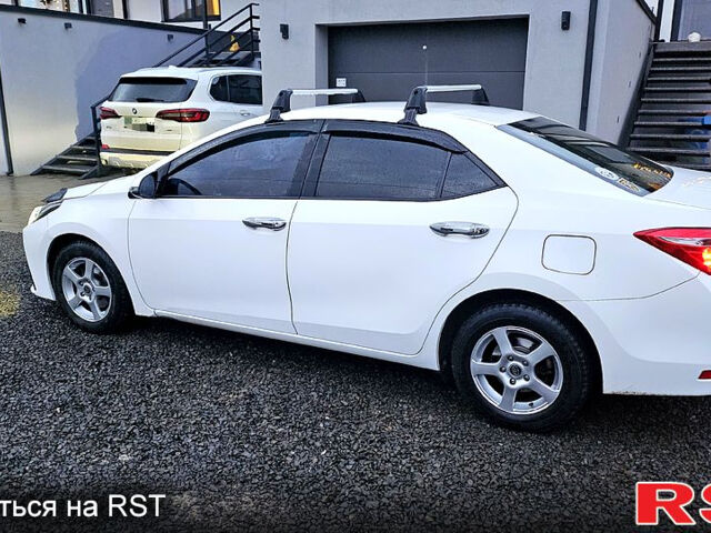 Белый Тойота Королла, объемом двигателя 1.3 л и пробегом 115 тыс. км за 12000 $, фото 1 на Automoto.ua