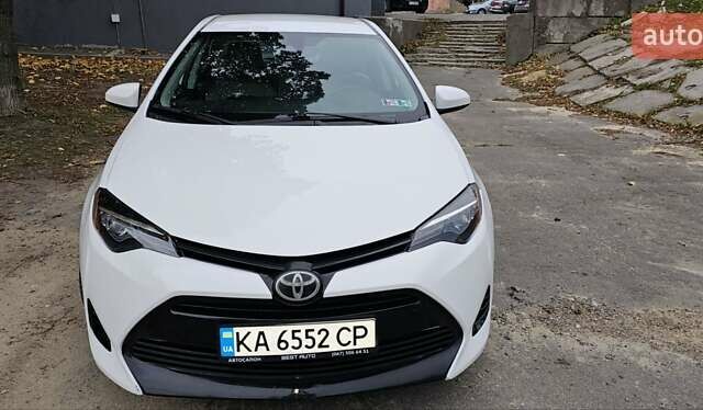 Белый Тойота Королла, объемом двигателя 1.8 л и пробегом 112 тыс. км за 12000 $, фото 1 на Automoto.ua