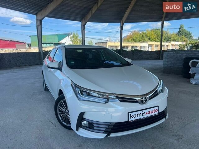 Білий Тойота Королла, об'ємом двигуна 1.6 л та пробігом 186 тис. км за 14599 $, фото 1 на Automoto.ua