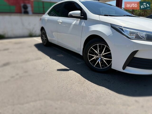 Білий Тойота Королла, об'ємом двигуна 1.6 л та пробігом 117 тис. км за 12700 $, фото 1 на Automoto.ua
