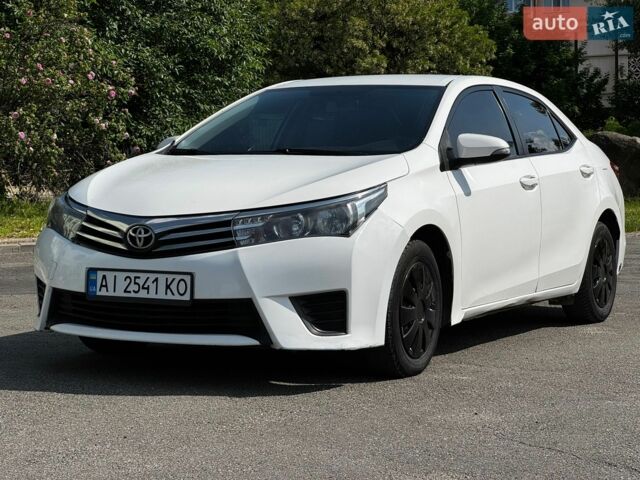 Білий Тойота Королла, об'ємом двигуна 1.33 л та пробігом 188 тис. км за 7999 $, фото 1 на Automoto.ua