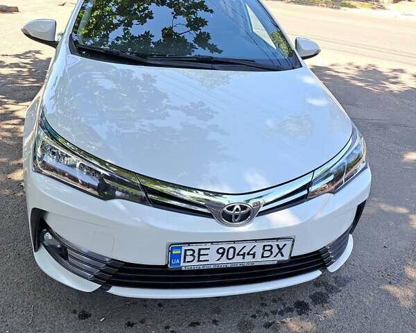 Белый Тойота Королла, объемом двигателя 1.6 л и пробегом 160 тыс. км за 14700 $, фото 1 на Automoto.ua