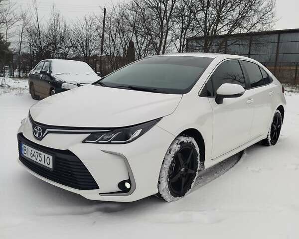 Білий Тойота Королла, об'ємом двигуна 1.6 л та пробігом 195 тис. км за 15000 $, фото 1 на Automoto.ua