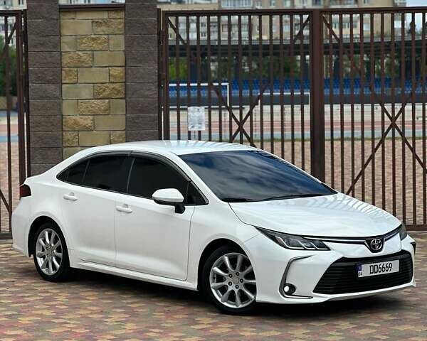 Белый Тойота Королла, объемом двигателя 1.6 л и пробегом 130 тыс. км за 14699 $, фото 1 на Automoto.ua