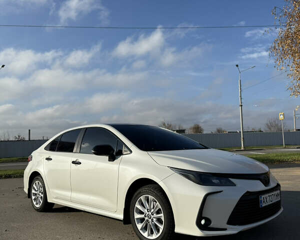 Білий Тойота Королла, об'ємом двигуна 1.8 л та пробігом 170 тис. км за 19500 $, фото 1 на Automoto.ua