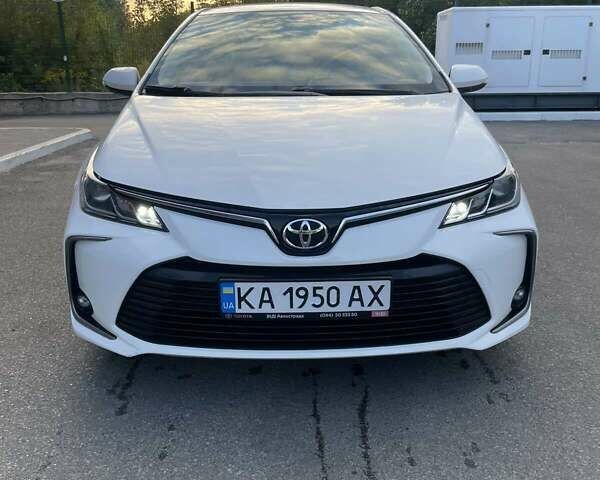 Белый Тойота Королла, объемом двигателя 1.6 л и пробегом 123 тыс. км за 15000 $, фото 1 на Automoto.ua