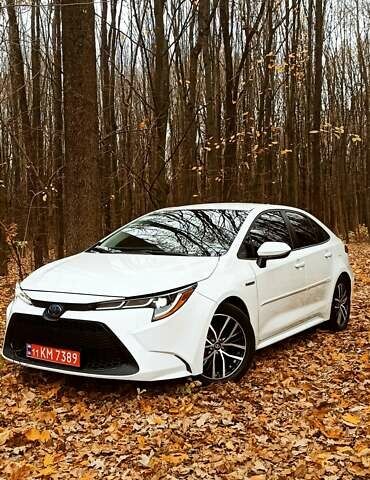 Білий Тойота Королла, об'ємом двигуна 1.8 л та пробігом 169 тис. км за 19900 $, фото 1 на Automoto.ua