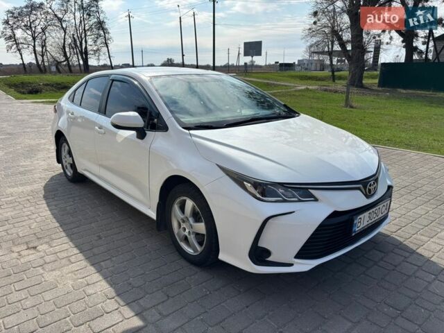 Білий Тойота Королла, об'ємом двигуна 1.6 л та пробігом 170 тис. км за 12999 $, фото 1 на Automoto.ua