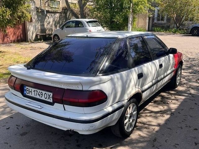 Белый Тойота Королла, объемом двигателя 1.3 л и пробегом 400 тыс. км за 850 $, фото 1 на Automoto.ua