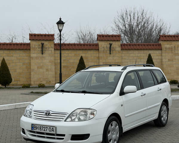 Білий Тойота Королла, об'ємом двигуна 1.36 л та пробігом 230 тис. км за 6300 $, фото 1 на Automoto.ua