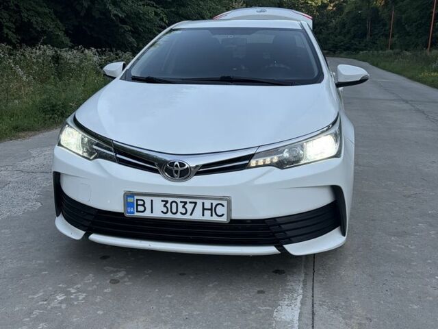 Білий Тойота Королла, об'ємом двигуна 1.3 л та пробігом 121 тис. км за 11467 $, фото 1 на Automoto.ua