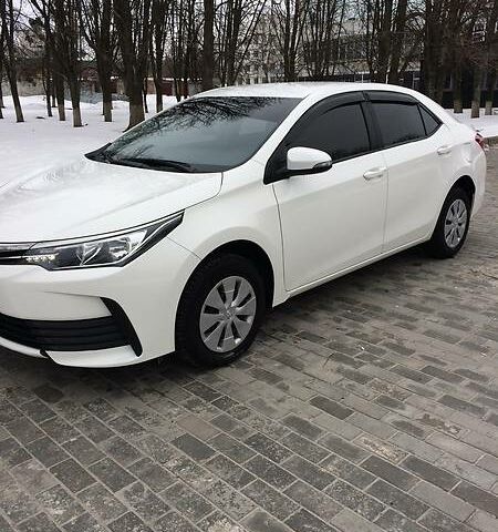 Білий Тойота Королла, об'ємом двигуна 1.6 л та пробігом 22 тис. км за 17500 $, фото 1 на Automoto.ua