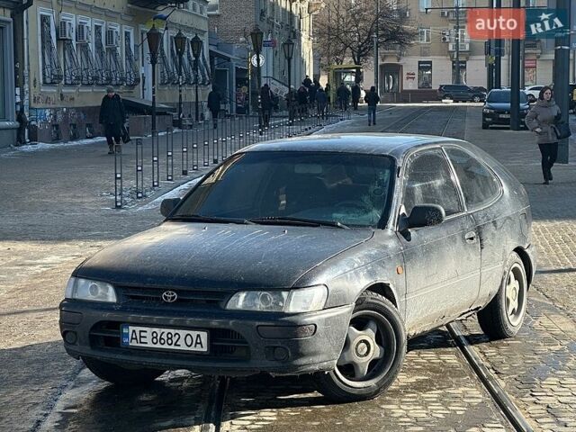 Черный Тойота Королла, объемом двигателя 1.59 л и пробегом 443 тыс. км за 1200 $, фото 1 на Automoto.ua