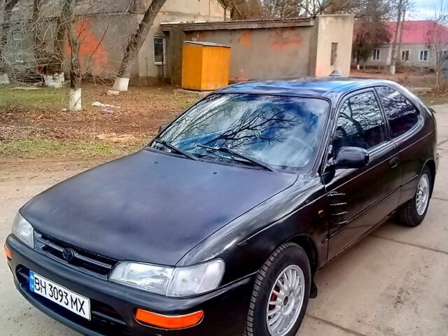 Черный Тойота Королла, объемом двигателя 1.6 л и пробегом 230 тыс. км за 1500 $, фото 1 на Automoto.ua