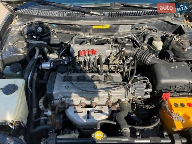 Черный Тойота Королла, объемом двигателя 1.33 л и пробегом 278 тыс. км за 2200 $, фото 1 на Automoto.ua