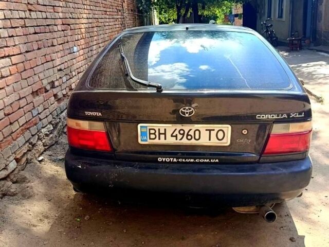 Чорний Тойота Королла, об'ємом двигуна 1.3 л та пробігом 150 тис. км за 2200 $, фото 1 на Automoto.ua