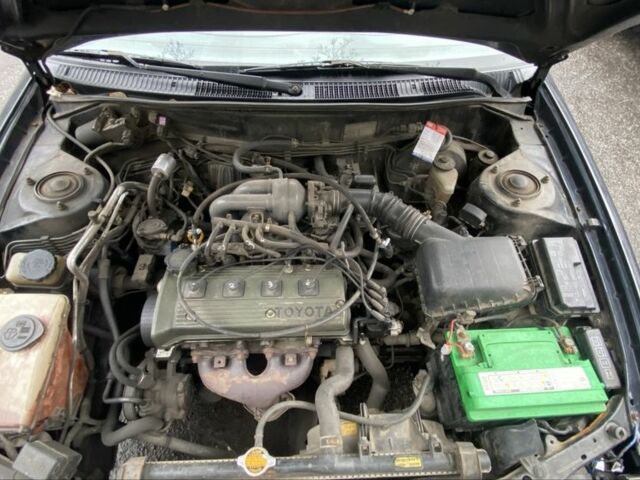 Черный Тойота Королла, объемом двигателя 1.4 л и пробегом 450 тыс. км за 1700 $, фото 1 на Automoto.ua