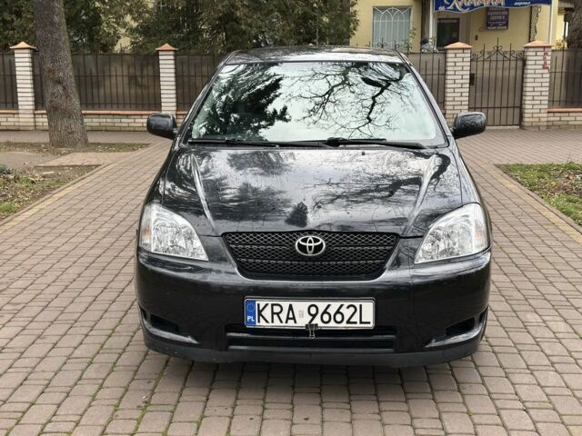 Черный Тойота Королла, объемом двигателя 2 л и пробегом 290 тыс. км за 1650 $, фото 1 на Automoto.ua