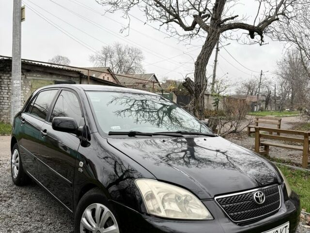 Чорний Тойота Королла, об'ємом двигуна 2 л та пробігом 300 тис. км за 4200 $, фото 1 на Automoto.ua
