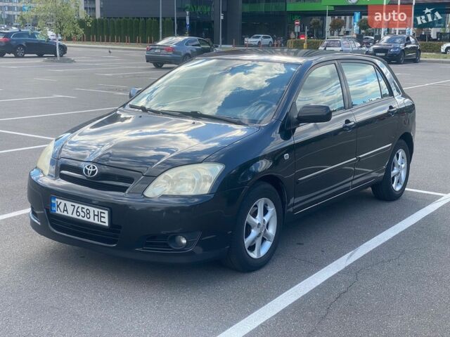 Чорний Тойота Королла, об'ємом двигуна 2 л та пробігом 303 тис. км за 4999 $, фото 1 на Automoto.ua