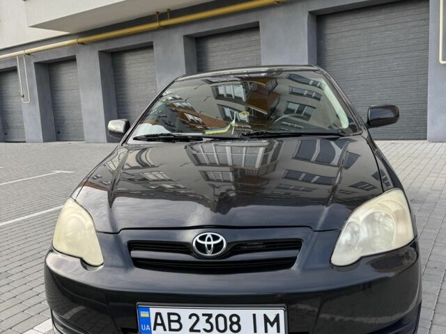 Чорний Тойота Королла, об'ємом двигуна 1.4 л та пробігом 207 тис. км за 5500 $, фото 1 на Automoto.ua