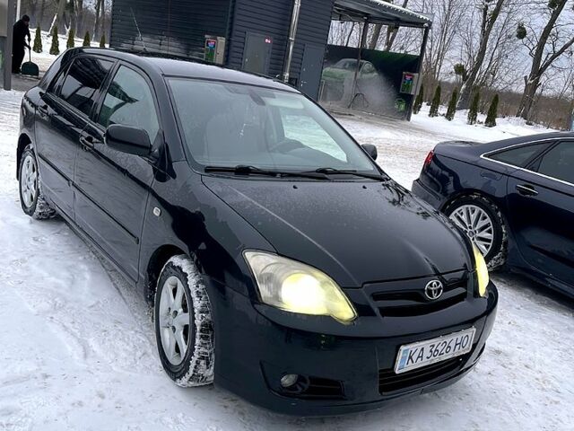 Чорний Тойота Королла, об'ємом двигуна 2 л та пробігом 409 тис. км за 4600 $, фото 1 на Automoto.ua