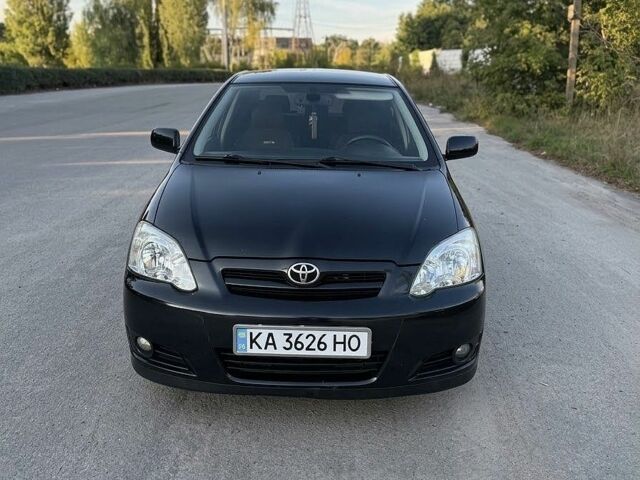 Чорний Тойота Королла, об'ємом двигуна 2 л та пробігом 285 тис. км за 4100 $, фото 1 на Automoto.ua