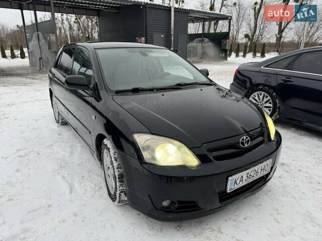 Черный Тойота Королла, объемом двигателя 2 л и пробегом 409 тыс. км за 4700 $, фото 1 на Automoto.ua