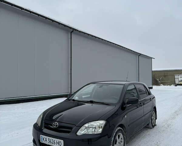 Чорний Тойота Королла, об'ємом двигуна 2 л та пробігом 280 тис. км за 5700 $, фото 1 на Automoto.ua