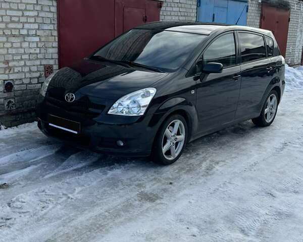 Черный Тойота Королла, объемом двигателя 2.23 л и пробегом 144 тыс. км за 7999 $, фото 1 на Automoto.ua