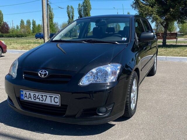 Черный Тойота Королла, объемом двигателя 2 л и пробегом 342 тыс. км за 4700 $, фото 1 на Automoto.ua