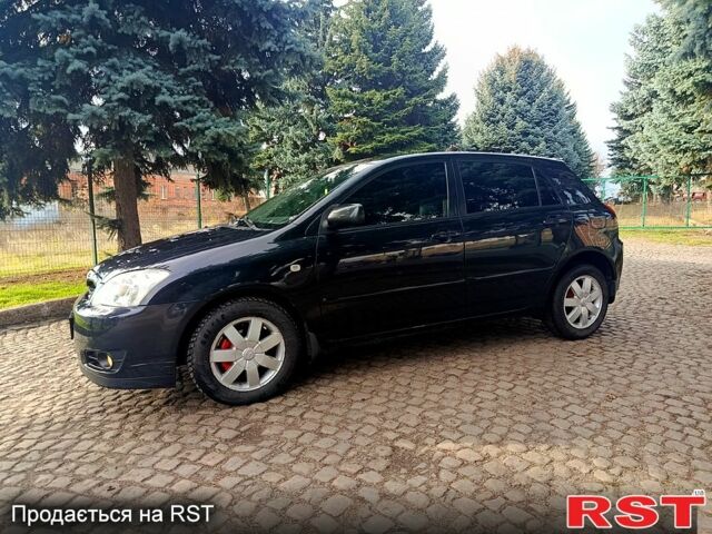 Черный Тойота Королла, объемом двигателя 1.6 л и пробегом 245 тыс. км за 5500 $, фото 1 на Automoto.ua