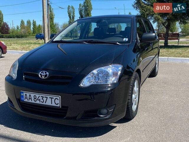 Черный Тойота Королла, объемом двигателя 2 л и пробегом 342 тыс. км за 5100 $, фото 1 на Automoto.ua